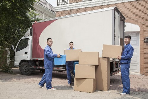 Removal van and moving boxes in a Crofton Park residential street