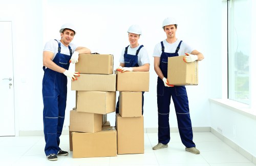 Van and mover assisting with furniture transport in South London